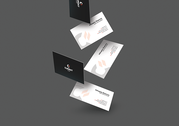 Curent Grup business cards with the refreshed black-and-red identity